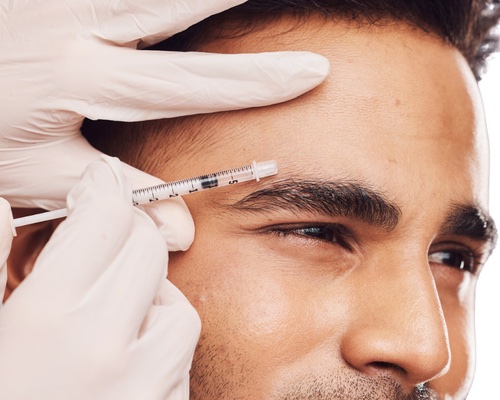 Image of a man getting botox